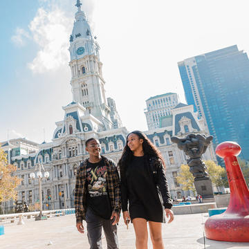 two saint joseph's university students walking in center city, philadelphia