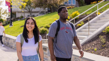 Undergraduate college students walking on the South Walk of Saint Joseph's campus in Philadelphia