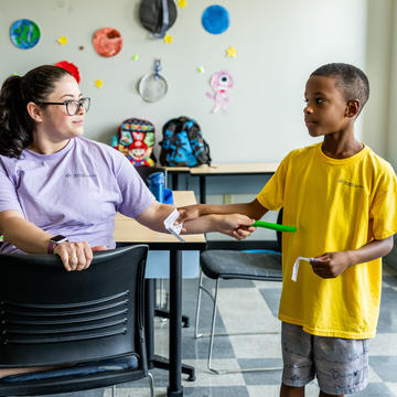 youth working with scholar