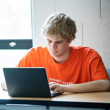 ASPIRE Student working on laptop