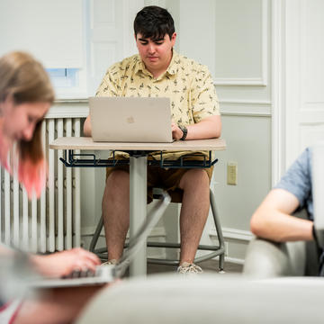 students working with laptops