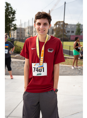 Nick with a Kinney 5K medal
