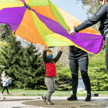 Playing with a parachute at Kinney Center