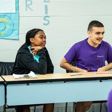 client and scholar sitting