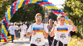 Crossing the finish line at the Kinney 5K