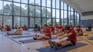 students doing yoga