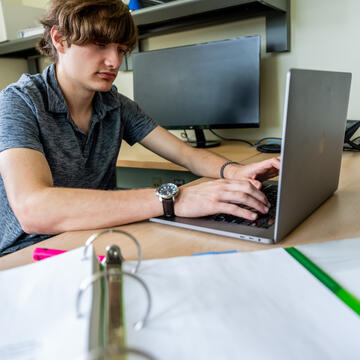 student working at computer