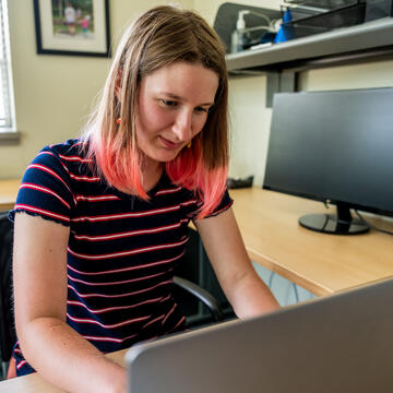 student sitting at computer