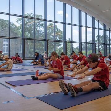 students doing yoga