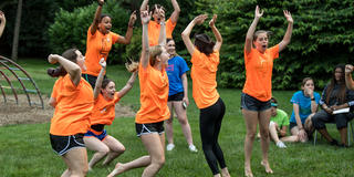 schoalrs cheering