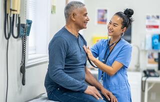 doctor assessing patient