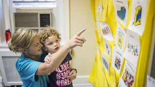 SCHOLAR teaching little girl