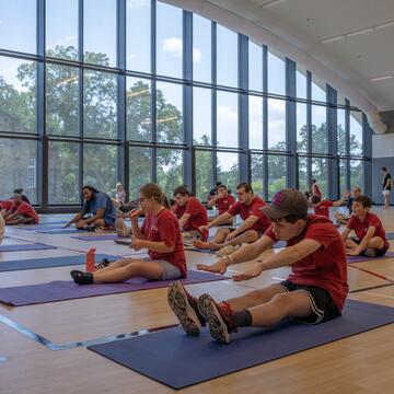 students doing yoga