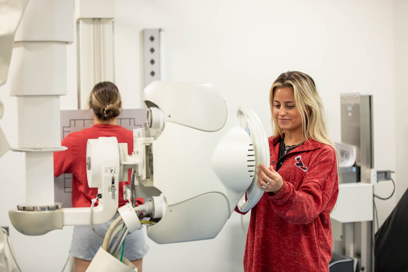 Saint Joseph's University students practicing taking x-rays on patients