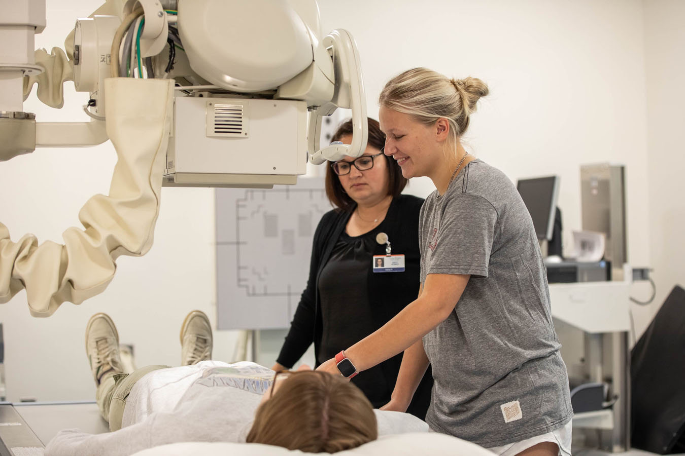 Saint Joseph's University students practicing taking x-rays on patients