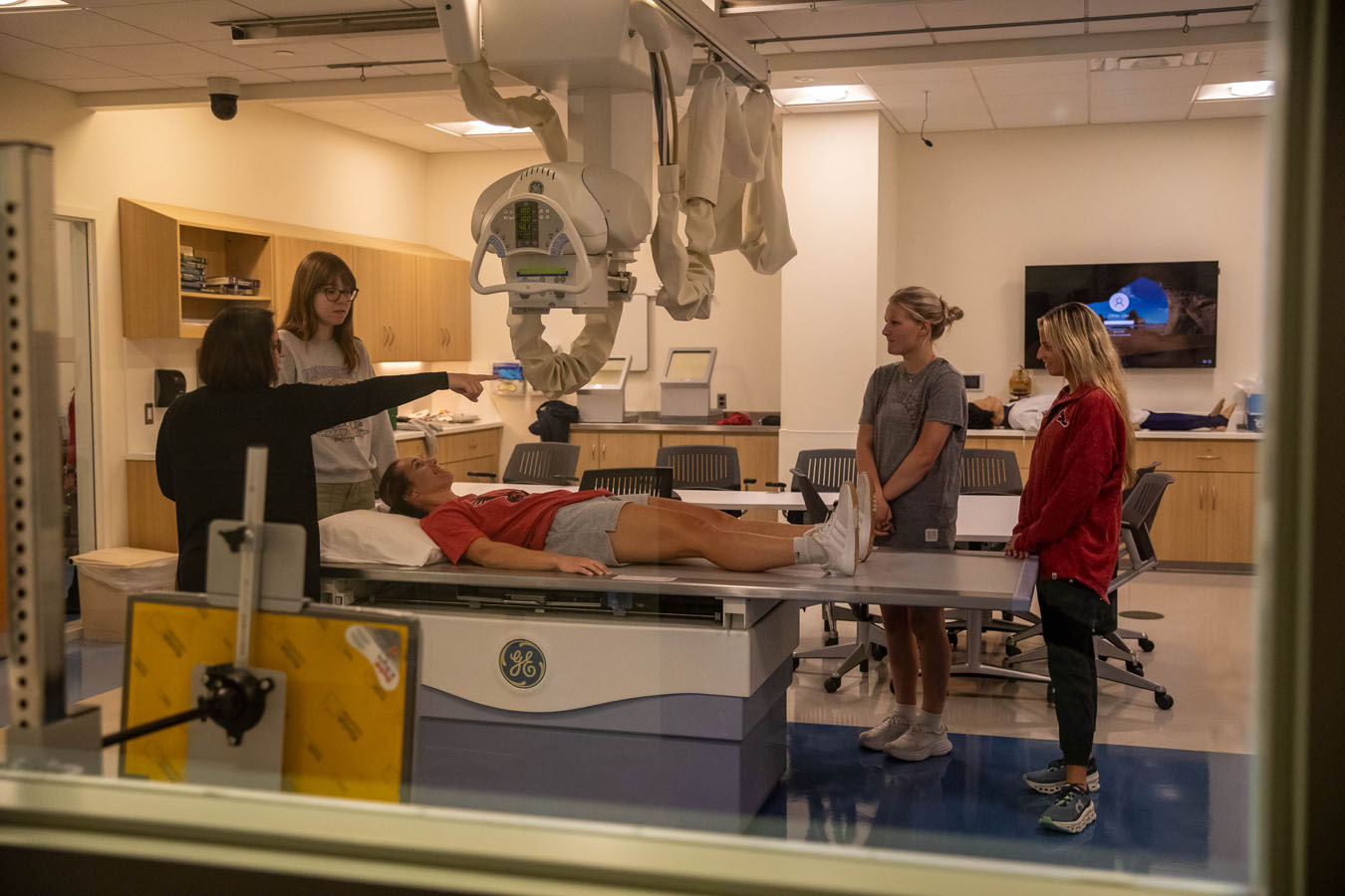 Saint Joseph's University students practicing taking x-rays on patients in simulation lab