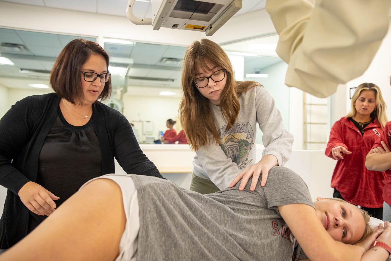 Saint Joseph's University students practicing taking x-rays on patients in simulation lab