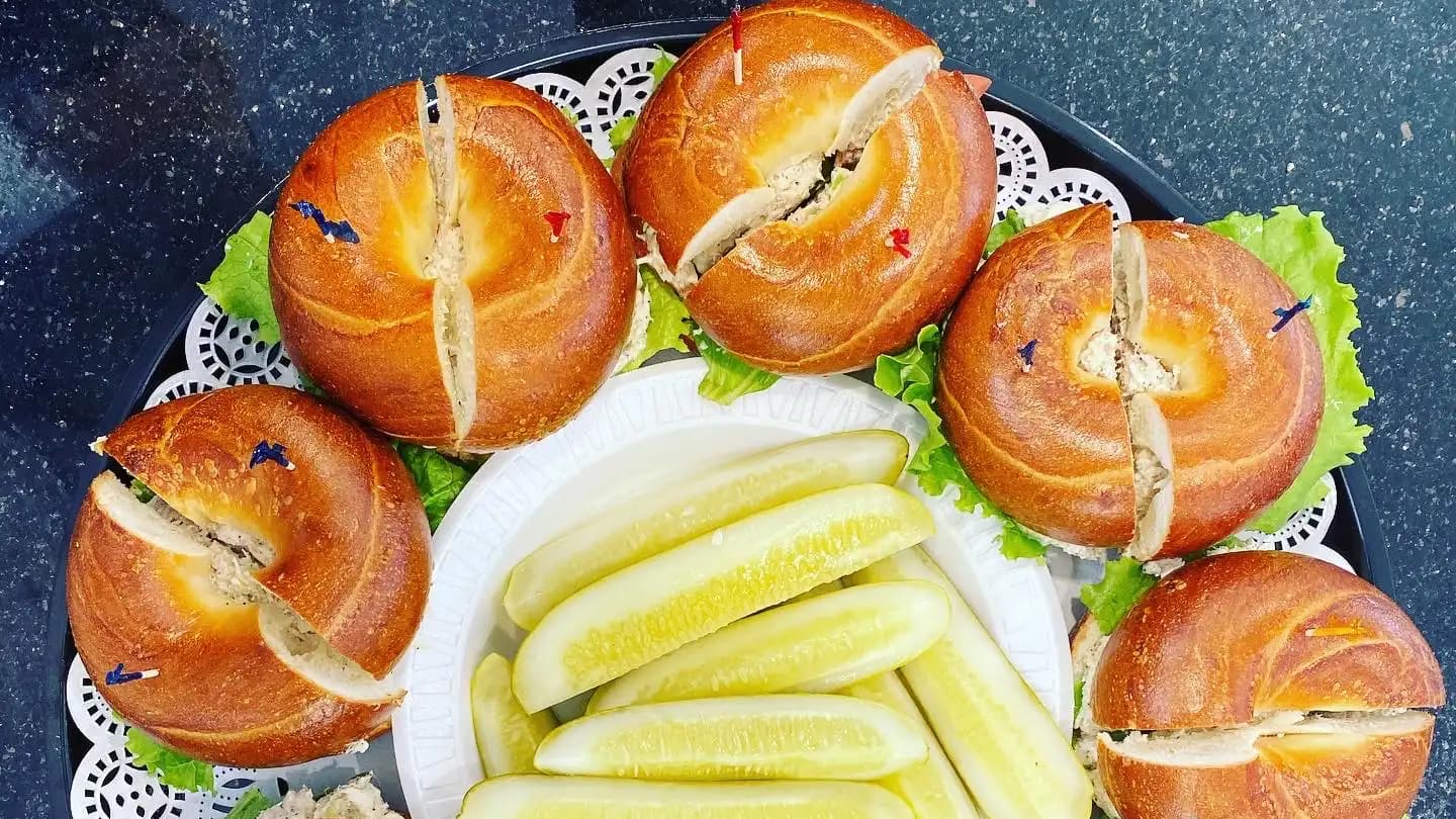 A tray of bagels and pickles