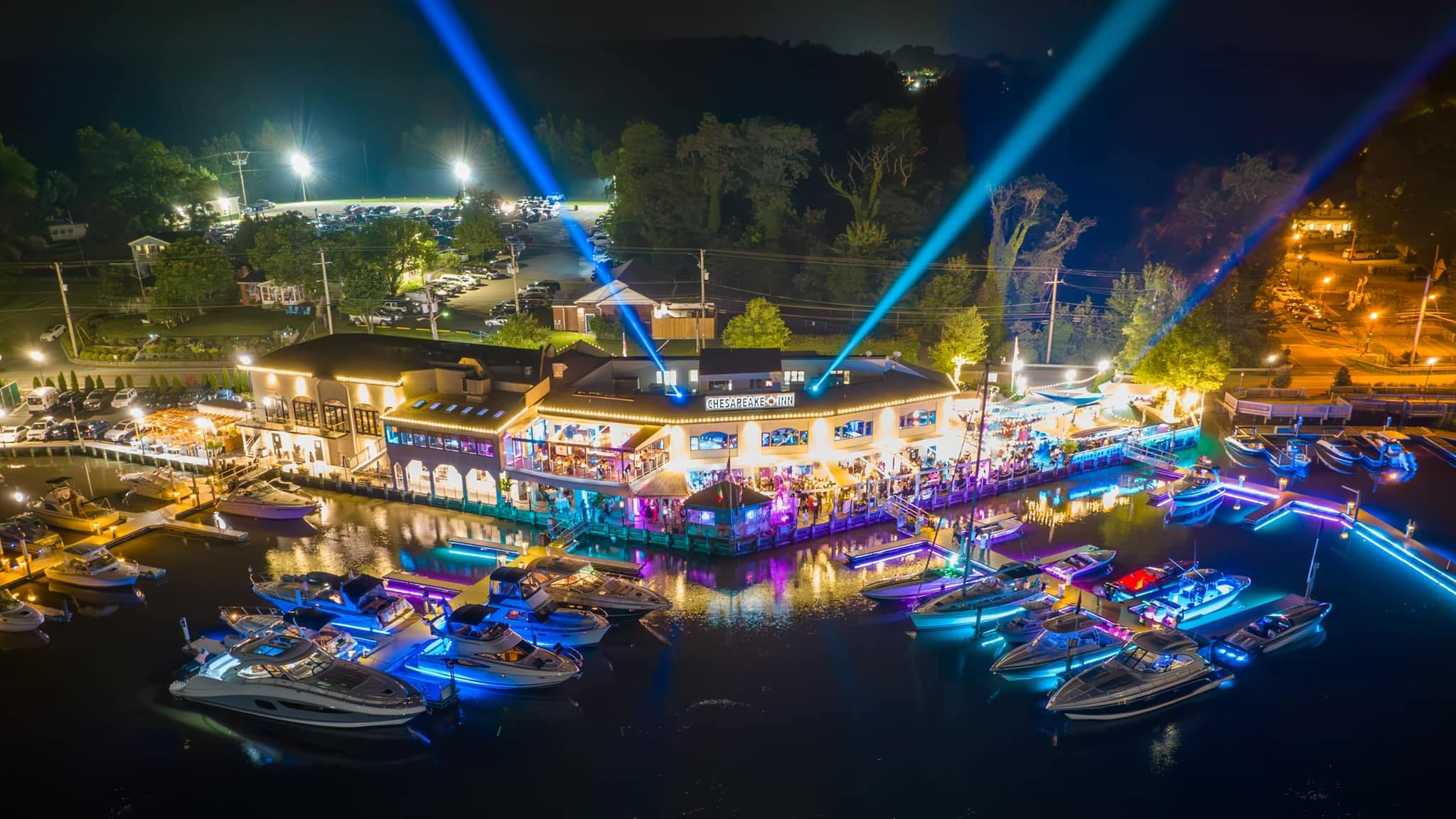 A view of the marina lit up for a party 