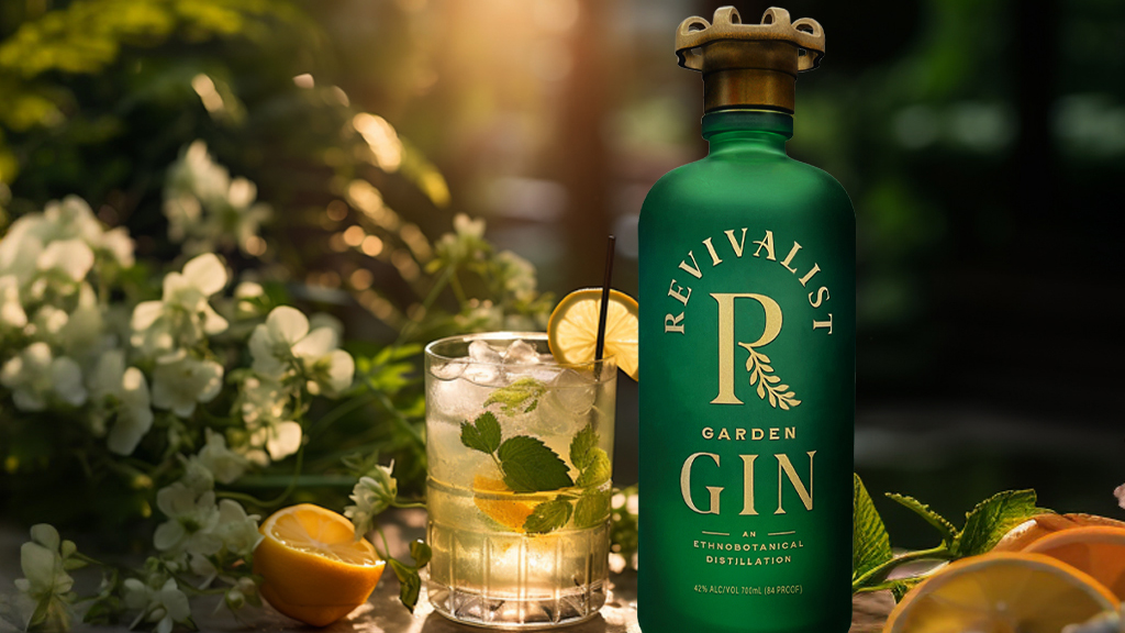green gin bottle with full glass next to it