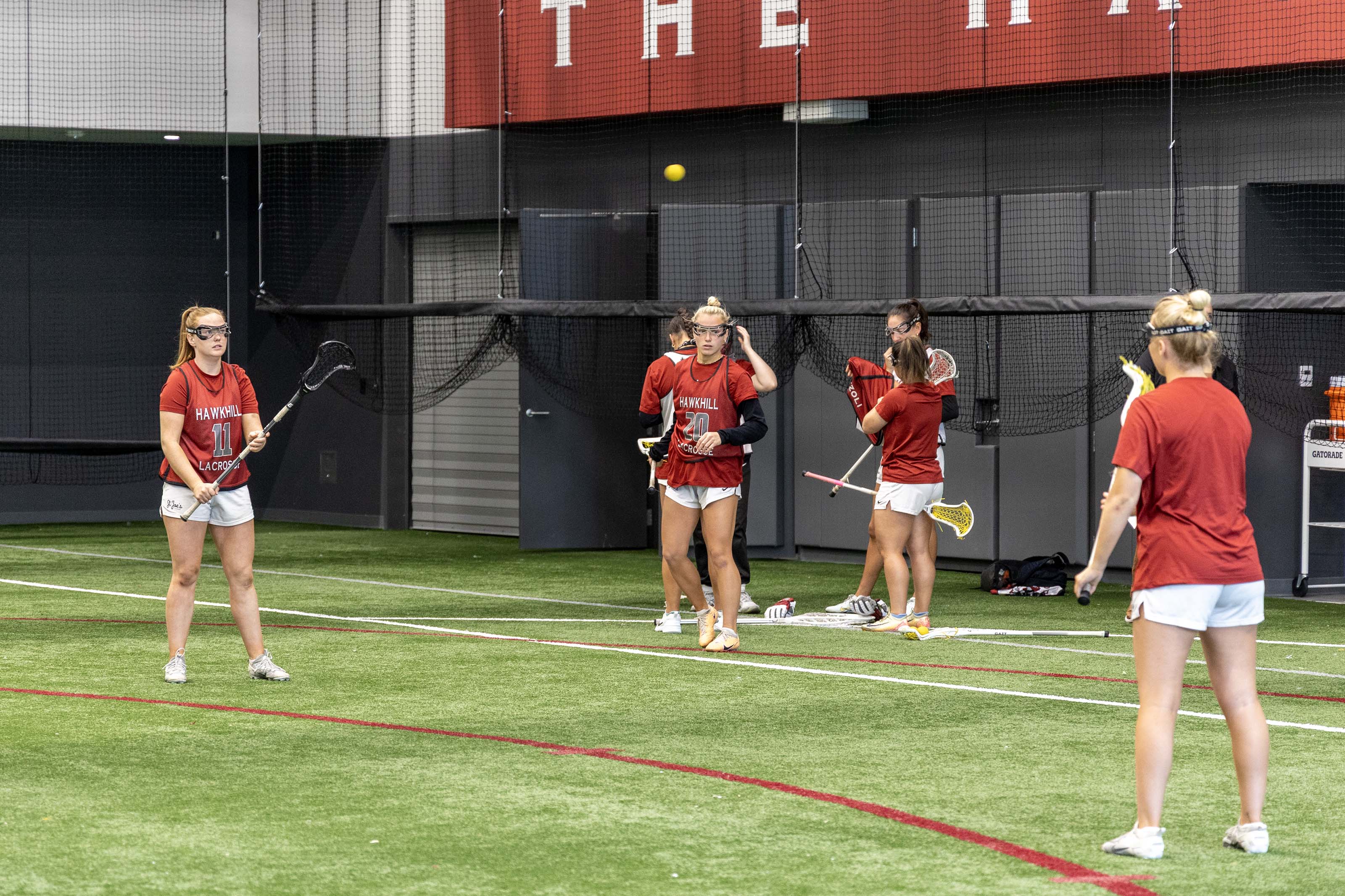 Maguire Athletic Center turf field with student athletes practicing