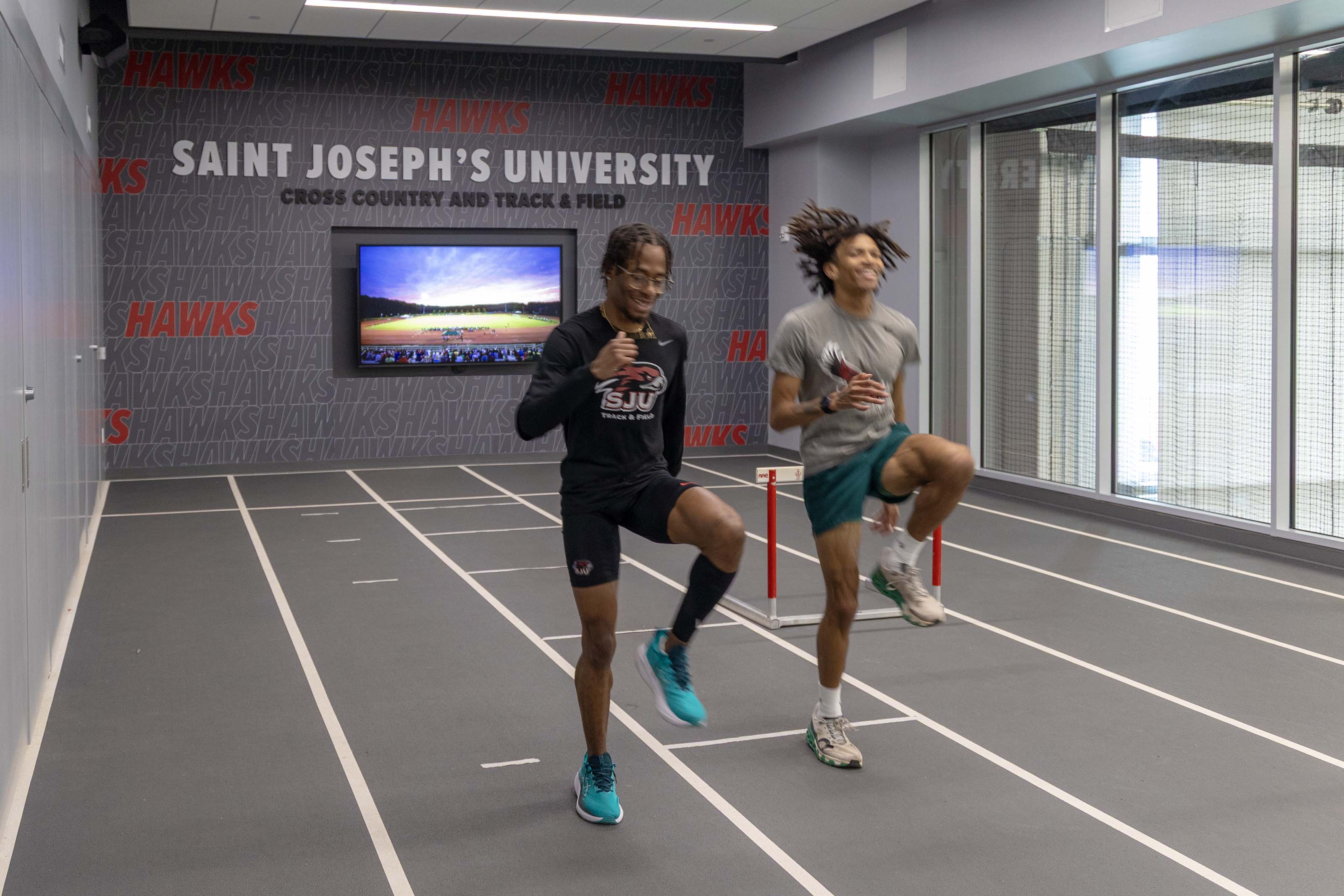 Maguire Athletic Center Sprint track with student-athletes on the track