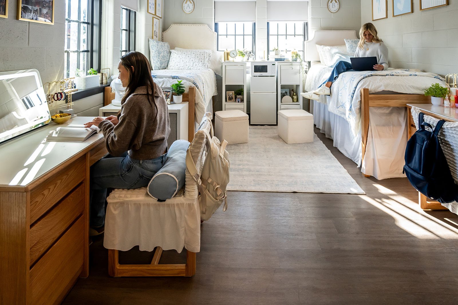 A student working in a spacious dorm room