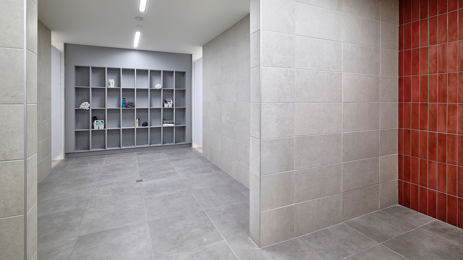 A large room with stone tiles