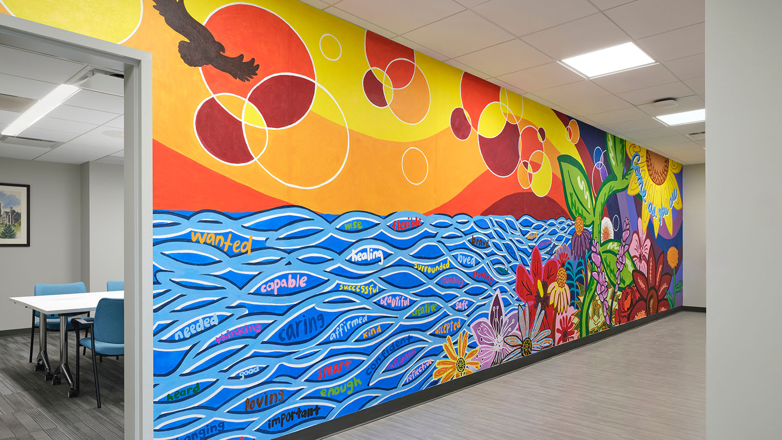 A colorful mural of a sunset