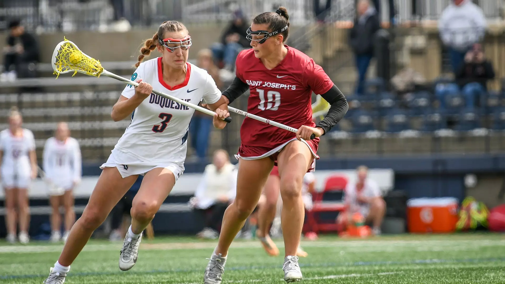Saint Joseph's Bella Miceli on field during lacrosse game against component