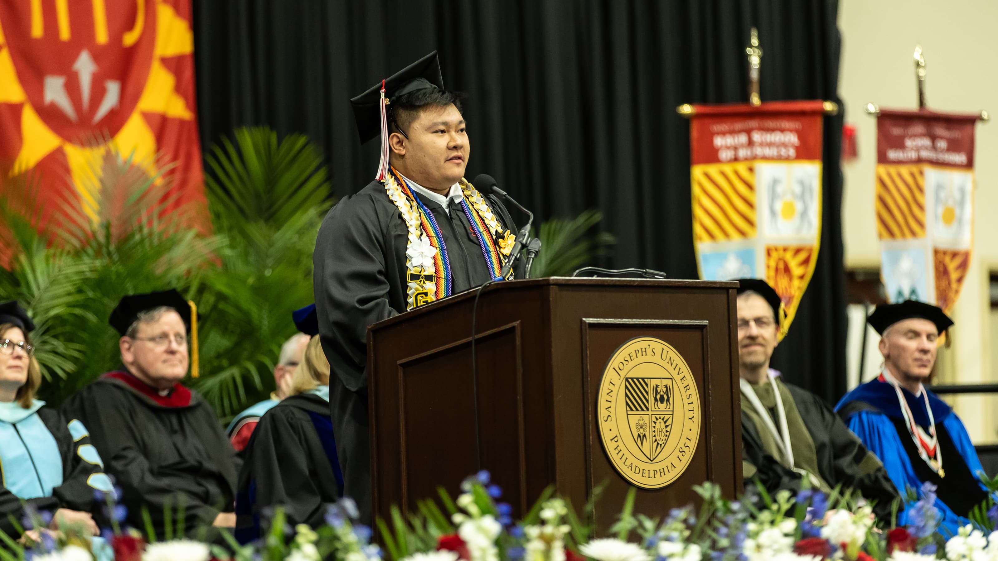 School of Health Professions student speaker Jason Vo at the podium