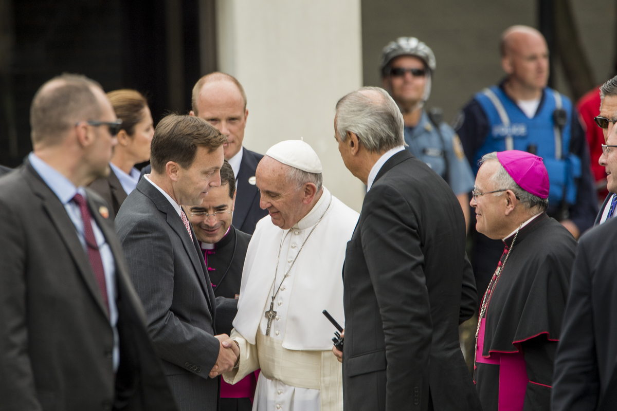 University President Mark C. Reed, Ed.D., greets Pope Francis on campus, Sept. 27, 2015.