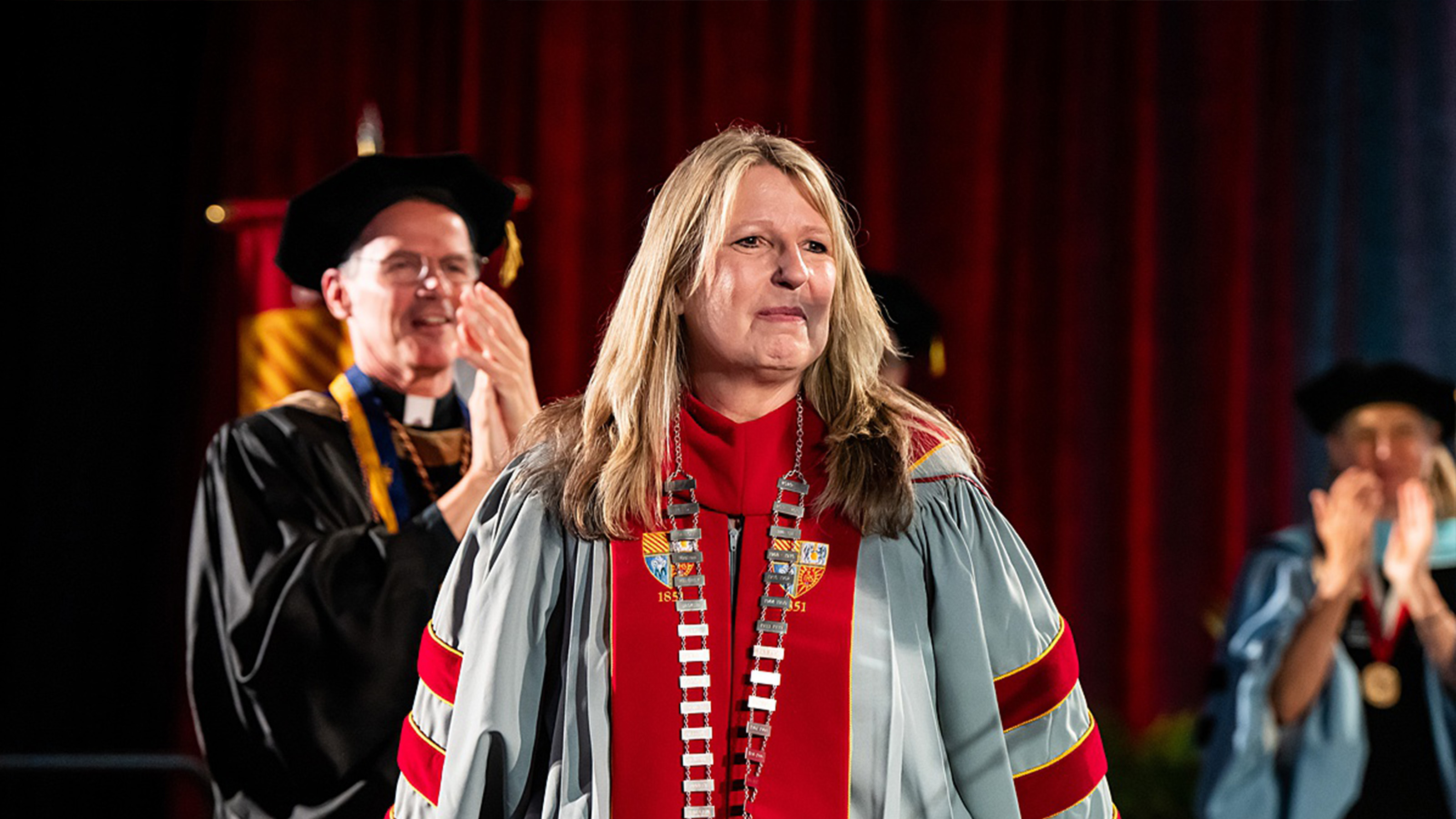 The crowd celebrates newly inaugurated President Cheryl A. McConnell, PhD.