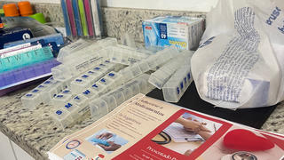 Pill boxes and pamphlets provided to patients during the Script Your Future team’s trip to Costa Rica.