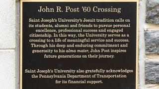 The commemorative plaque for John R. Post.