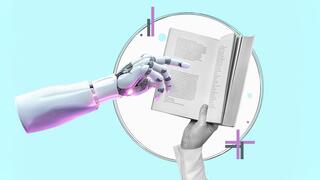 Robotic hand and human hand holding one side of a textbook open