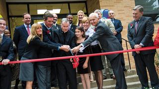 Paul and Margaret Hondros with Saint Joseph's representatives at ribbon cutting for Kinney Center