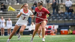 Saint Joseph's Bella Miceli on field during lacrosse game against component