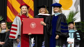 Joan Rosenhauer accepting her honorary degree
