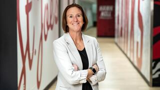 Portrait of Jill Bodensteiner with arms crossed 