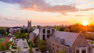 Aerial view of Mandeville Hall at sunset