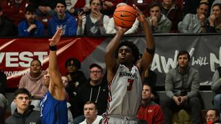 Cameron Brown shoots a basket
