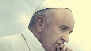 Pope Francis, dressed in white vestments, is shown in profile against a cloudy sky.
