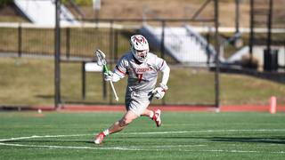 Zach Cole playing in a lacrosse game at Saint Joseph's University