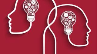 An illustration of two heads with light bulbs and gears, signifying ideas.