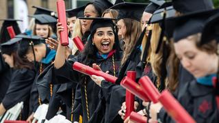 Saint Joseph's University students celebrating at the 2023 commencement