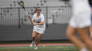 Saint Joseph's University women's lacrosse player Emma O'Neill on the field