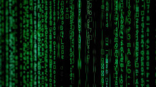 green numbers and symbols on a black background