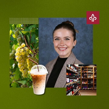 A woman smiling with a coffee cup next to her
