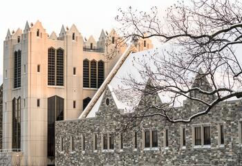 Mandeville Hall, home of the Haub School of Business, with snow on the roof